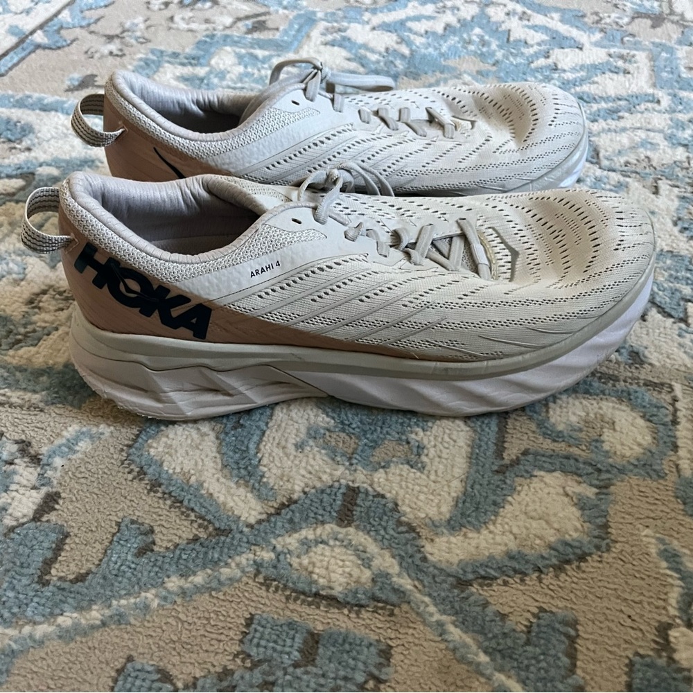 Hoka gray and brown running shoes